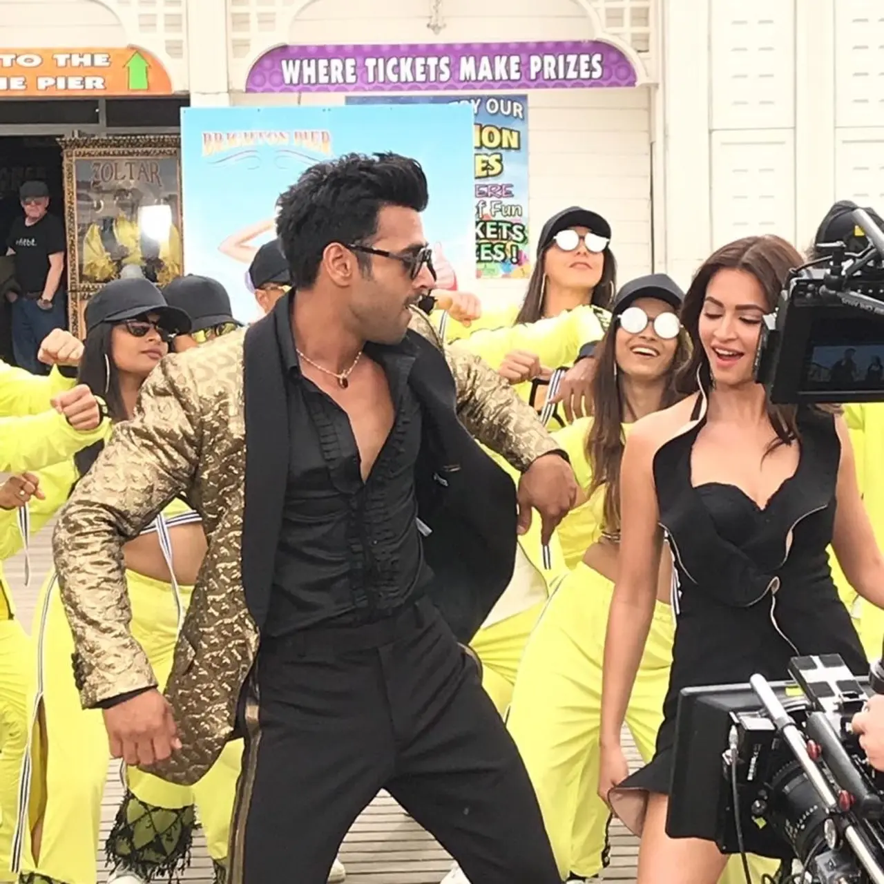 The still also featured a still from the shoot of their movie Pagalpanti. 