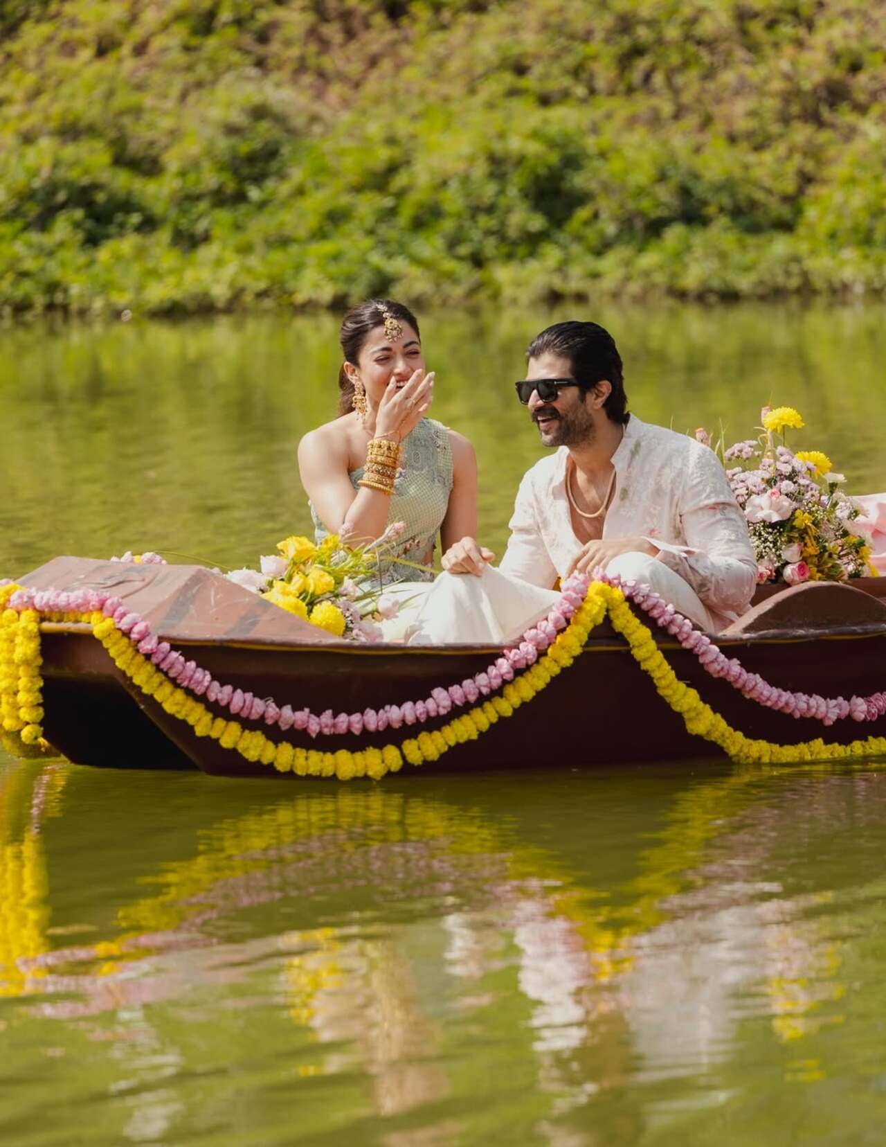 The photos captured the couple laughing together, enjoying the rituals as family members and close friends applied turmeric and showered them with blessings. 