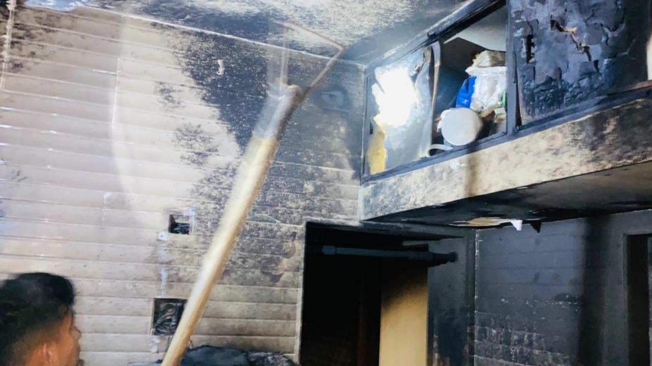 The fire caused damage to household appliances including a washing machine, refrigerator and electrical wiring, which were partially burnt.