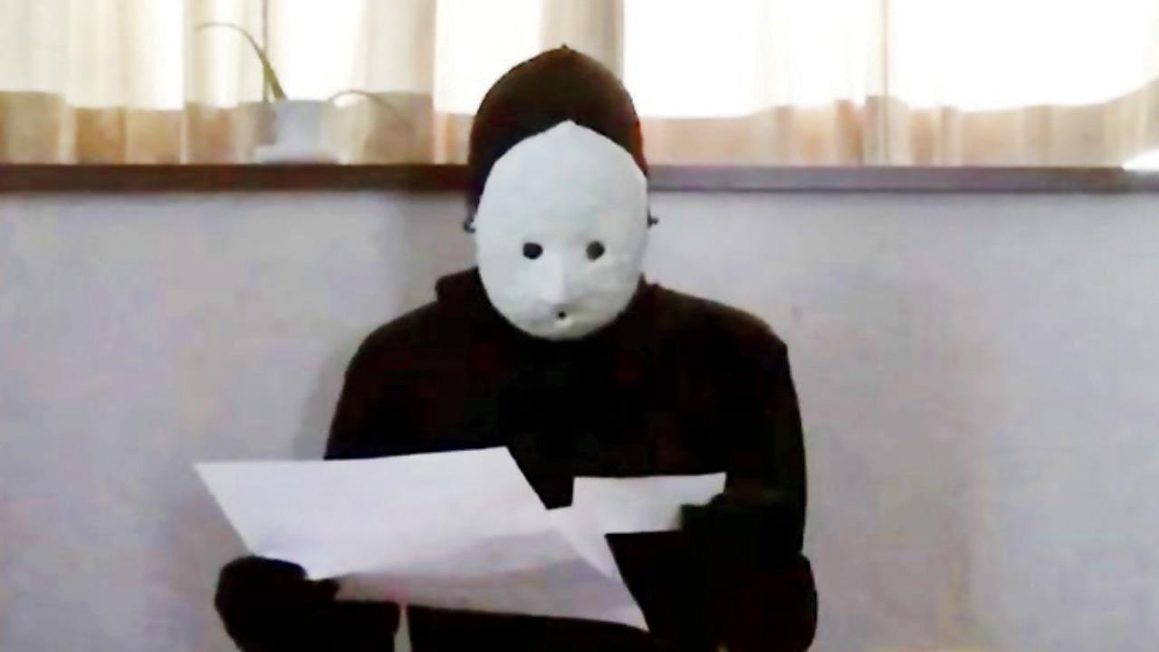 Uketsu studies the floor plan in a video that inspired his first book. Pic Courtesy/YouTube