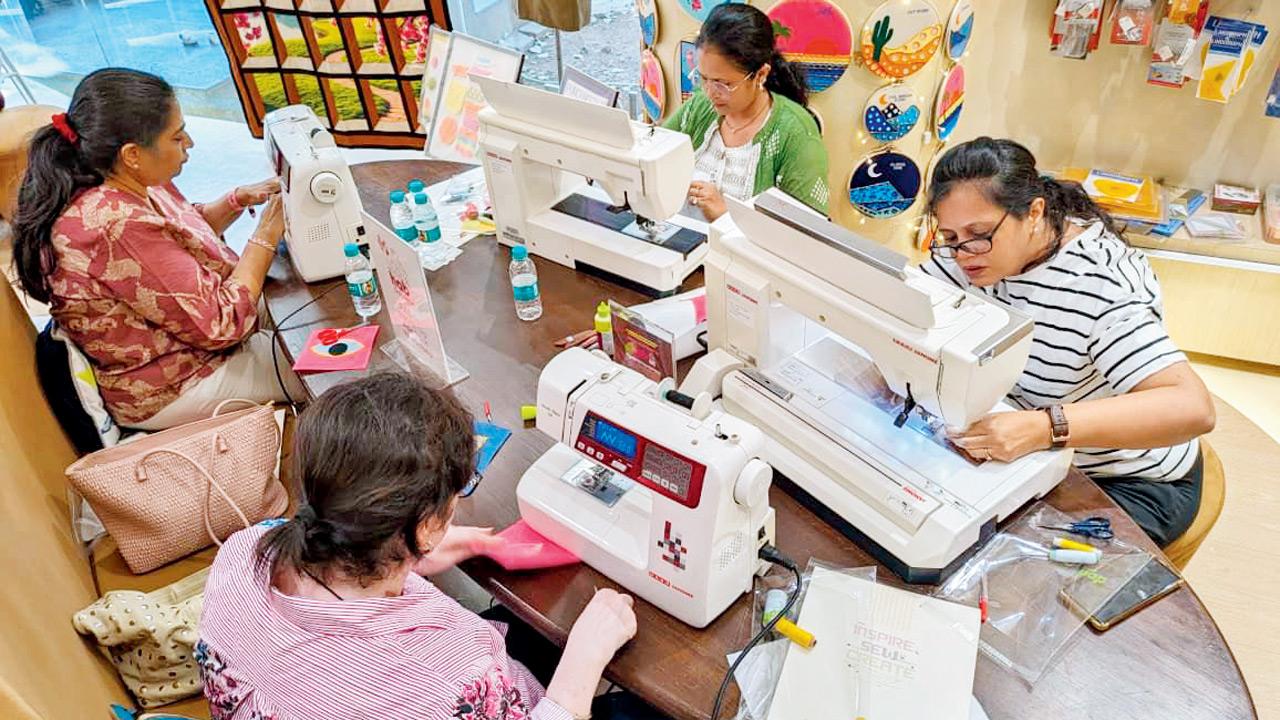 Participants work on sewing machines at a previous workshop. Pic courtesy/The Hab by Usha