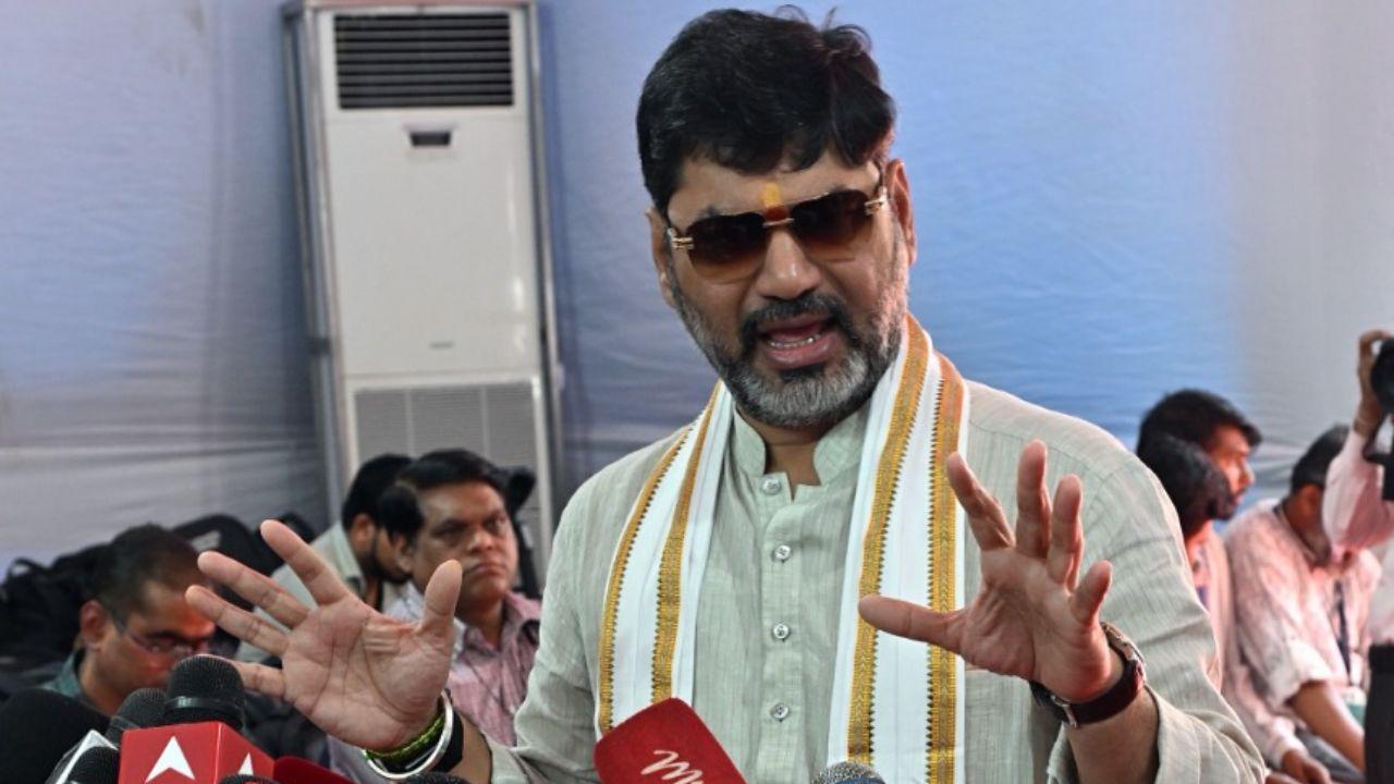 Former minister Dhananjay Munde speaks to the media before the proceedings