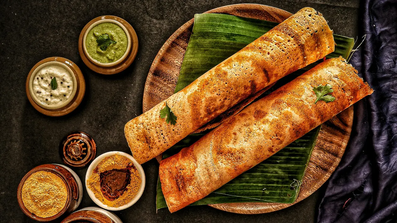 PesarattuSaurav Choudhuri, who is the executive chef at Novotel Visakhapatnam Varun Beach, says one variety that stands out is Pesarattu, which is a speciality from Andhra Pradesh and not known to many people. Unlike a classic dosa that relies on fermented rice and lentils, it uses soaked green moong, lending it an earthy depth and a naturally protein-forward profile without requiring long fermentation. In today’s health-conscious dining landscape, Pesarattu remains especially relevant as it is gluten-free, nourishing and deeply regional (Image for representational purpose only)
 