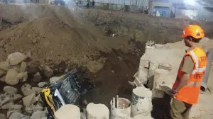 IN PHOTOS: Test-drive car crashes into vehicles, falls into construction pit