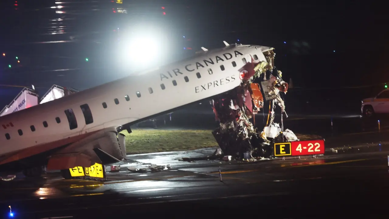 IN PHOTOS: Plane collides with fire truck at airport runway in New York