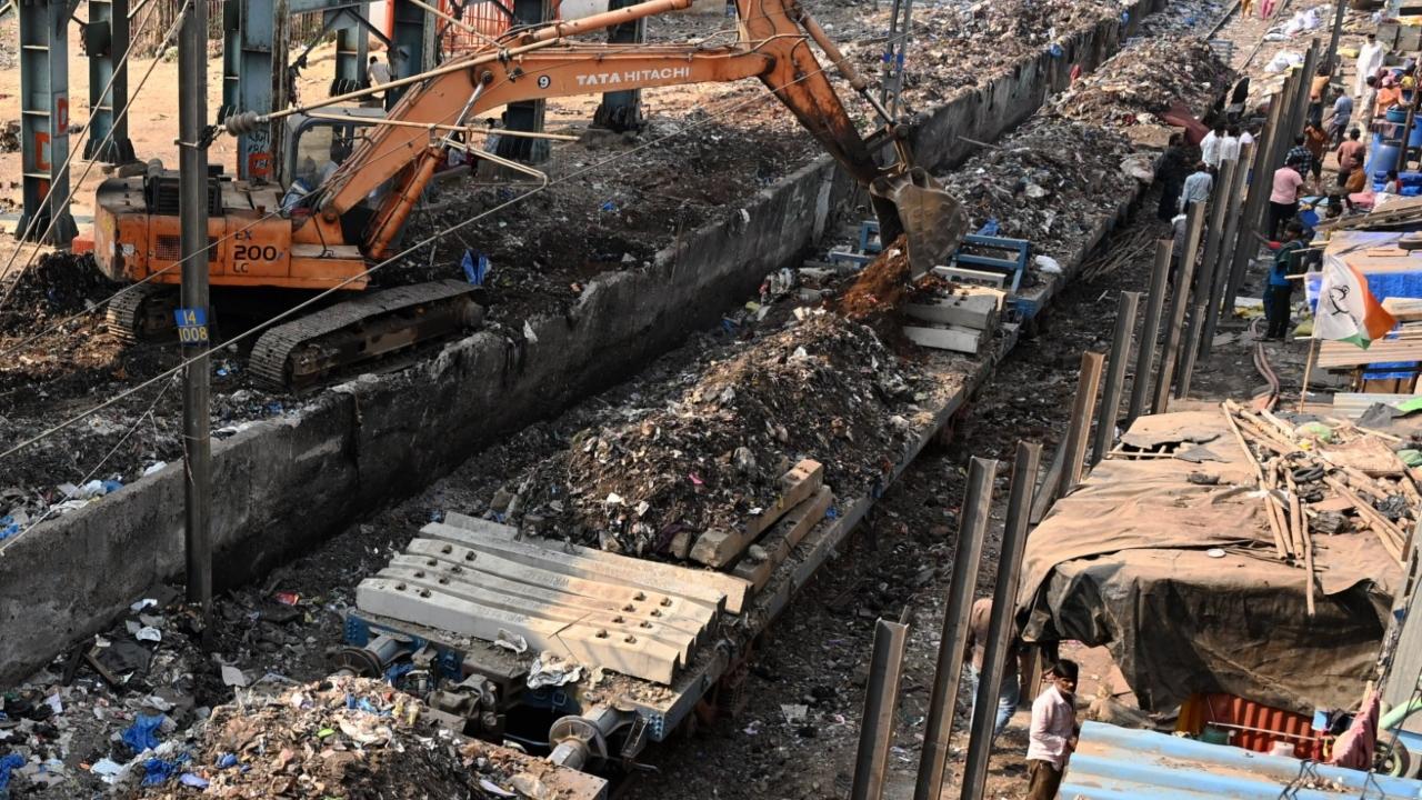 The work was being carried out on Wednesday in coordination with local authorities as part of an effort to improve safety and cleanliness along the railway corridor