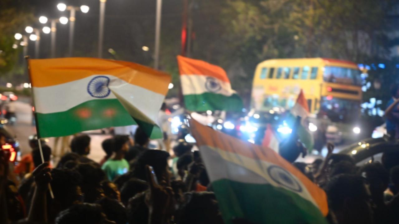 A flurry of Indian flags could be seen from a distance as a large crowd gathered at Marine Lines, near the Wankhede Stadium (Pic: Ashish Raje)