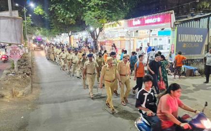 Manpada police conducts route march on Wednesday. (Pic/Special arrangement)