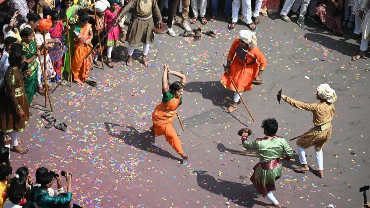 The streets were filled with excitement as groups gathered to participate in the grand celebrations. PIC/ ATUL KAMBLE