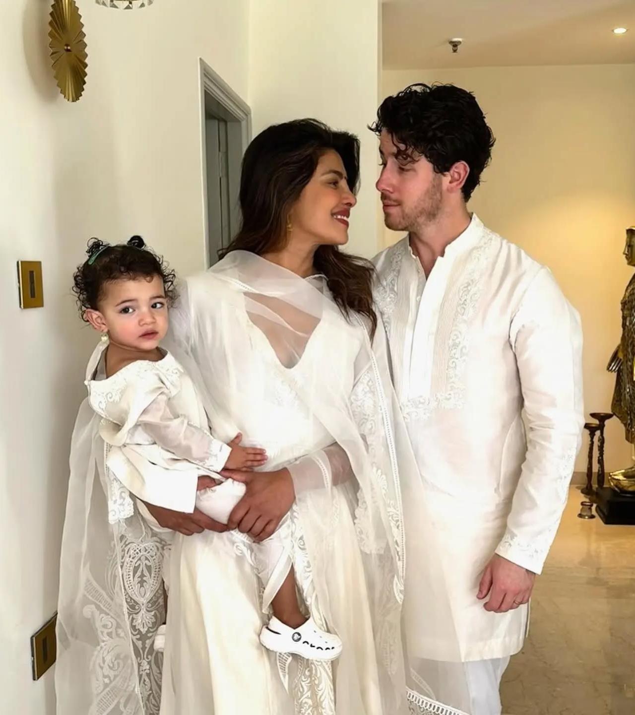 Priyanka Chopra keeps it effortlessly elegant for Holi in a dreamy all-white ensemble. She opts for a flowy embroidered kurta set layered with a sheer dupatta, blending tradition with understated glam.
