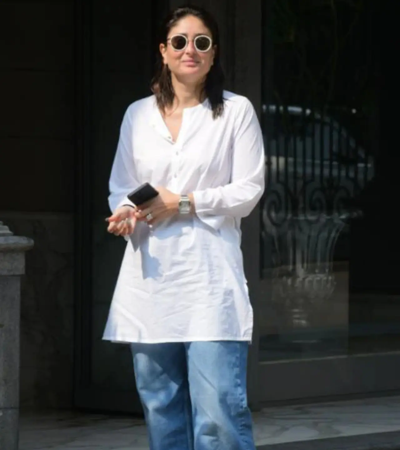 Kareena Kapoor Khan keeps it cool and fuss-free for Holi in a breezy white kurta paired with relaxed blue denims. The minimal silhouette makes it perfect for a playful day of colours, while still looking effortlessly chic.