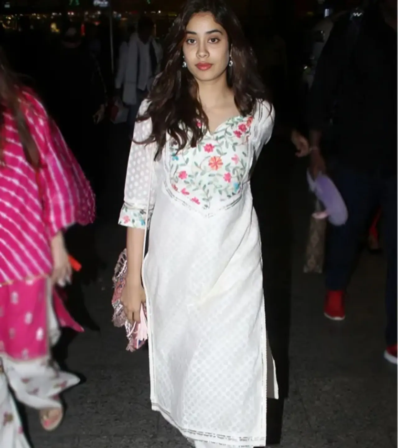 Janhvi Kapoor often steps out in elegant white suits elevated with subtle detailing. If you want something classic but not basic, a white kurta with light floral or thread work much like Janhvi’s pick is a safe and stylish bet.