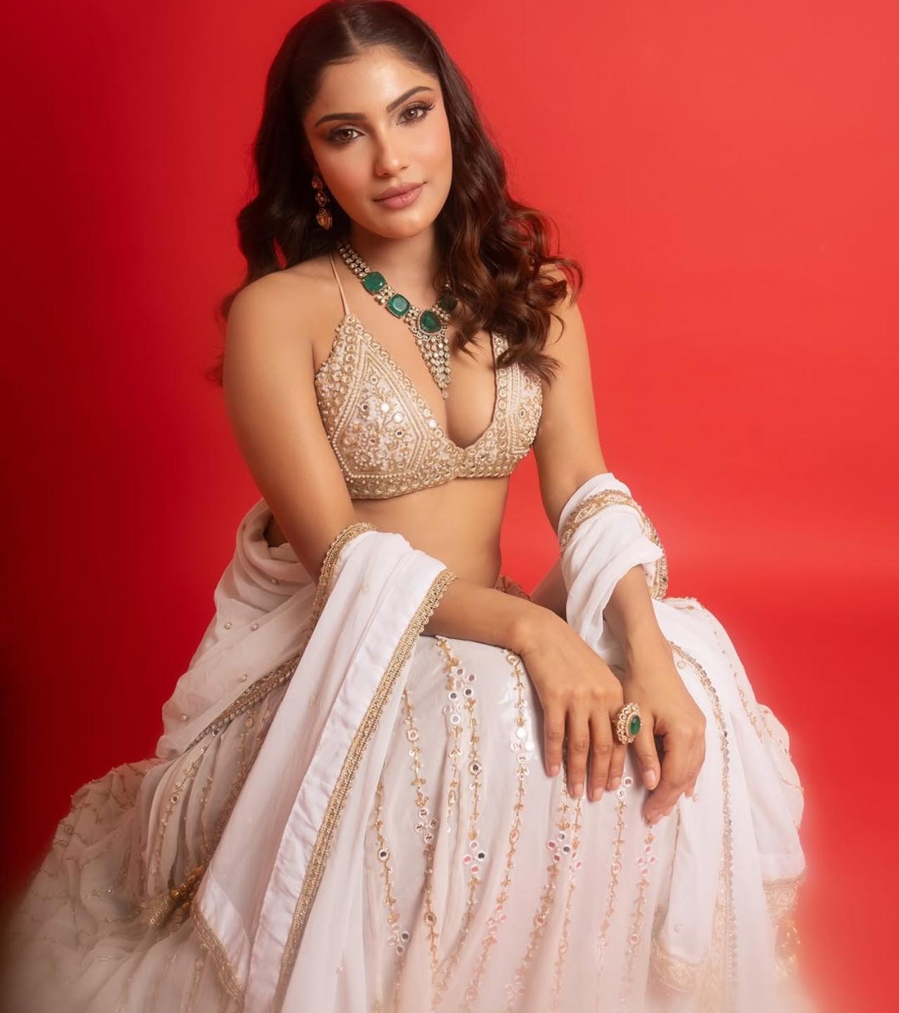 If easy-breezy festive fashion is your vibe, take notes from Ishita Raj who looks stunning in a playful all-white lehenga. It is the perfect pick for twirling through Holi festivities while staying effortlessly glam.