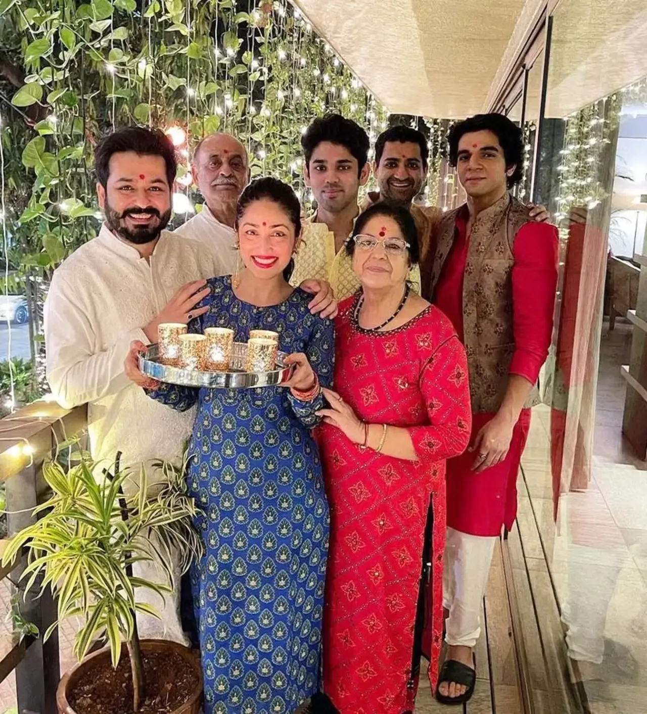 This joyful picture is from Aditya and Yami's first Diwali after marriage. They are seen posing with their family.