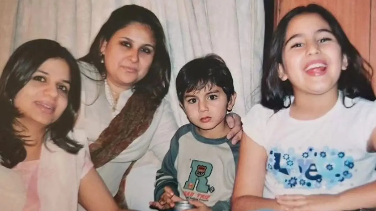 Ibrahim sits patiently as Sara shows excitement in this picture as they pose with aunts including Saba.