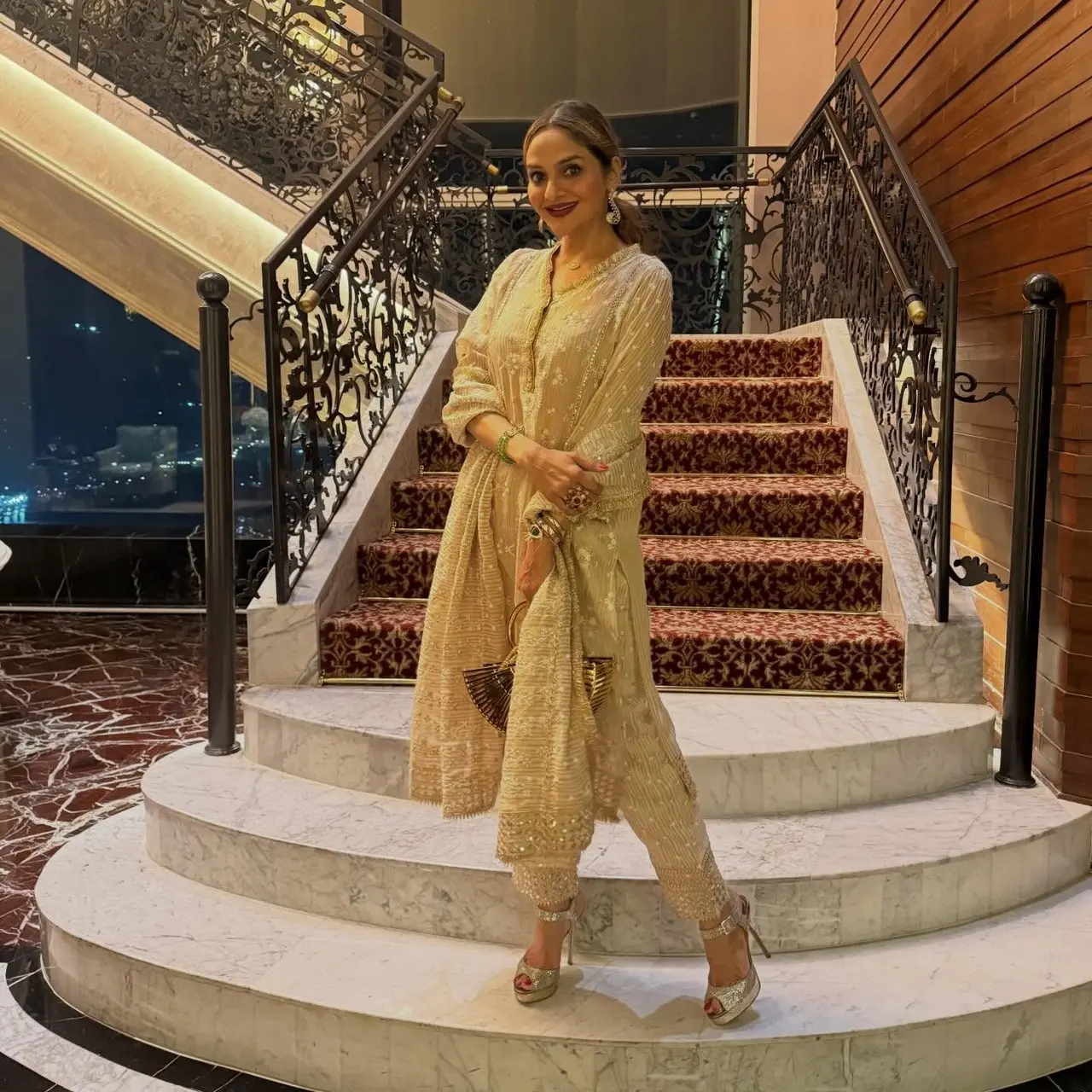 Madhoo dons a classy gold kurta and dupatta set that screams luxury and royalty.