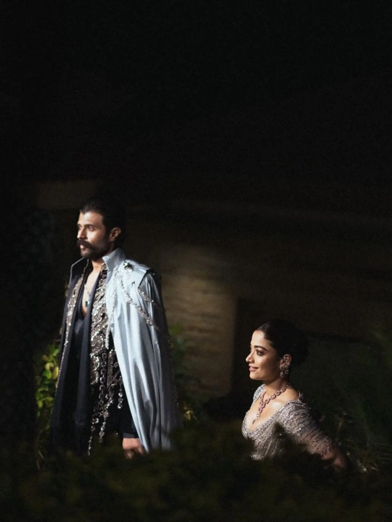 Vijay and Rashmika pose candidly for this elegant picture. Vijay is seen standing, while Rashmika sits and the sunlight peaks in.