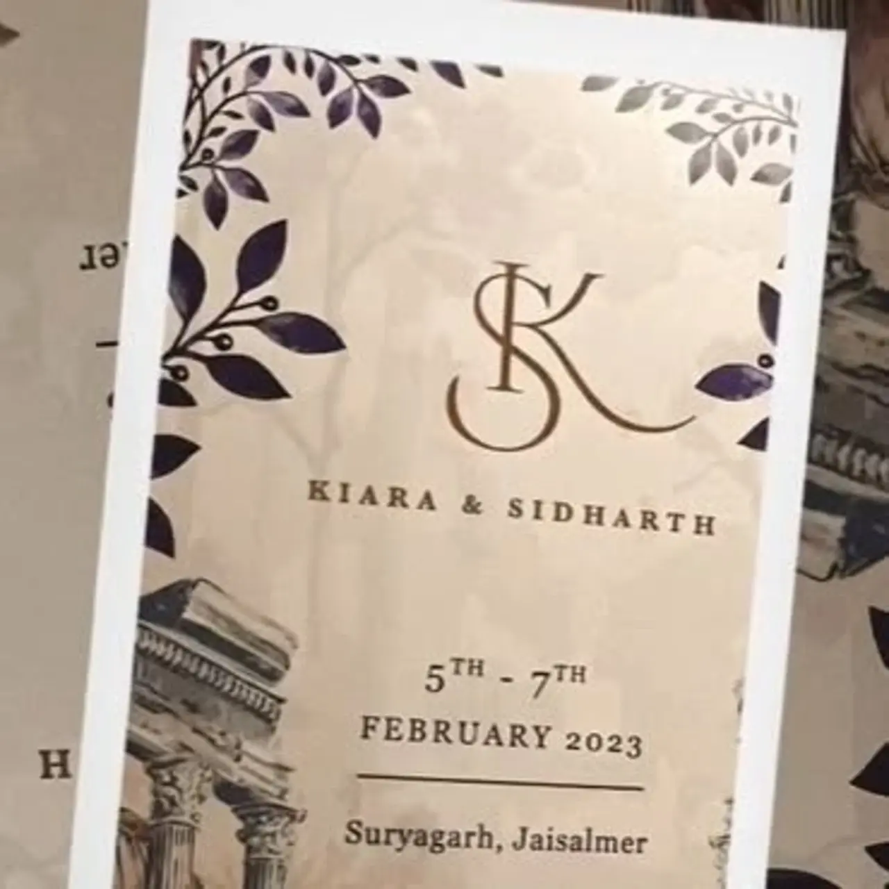 Sidharth and Kiara's wedding card had their initials intertwined with their names below it.