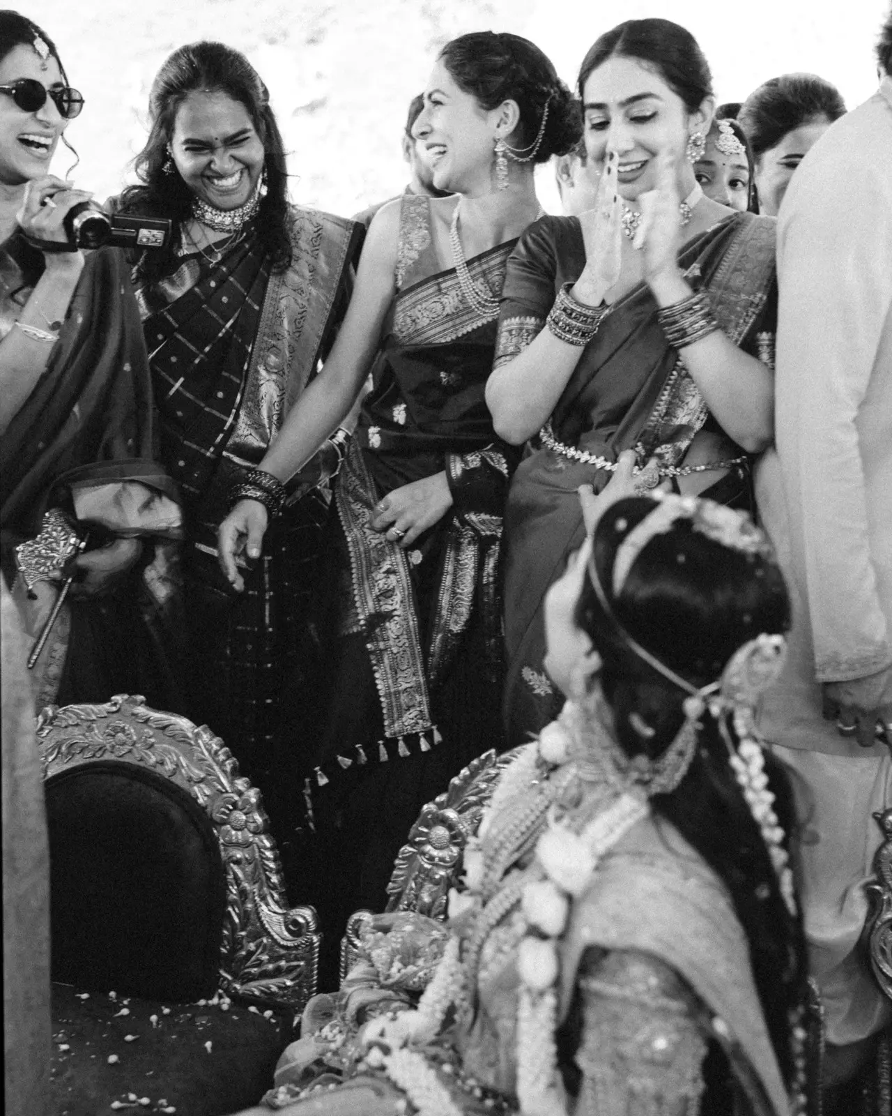 Rashmika looks at her girls as they hype her during the wedding ceremony in this picture. The joy on thier faces says it all.