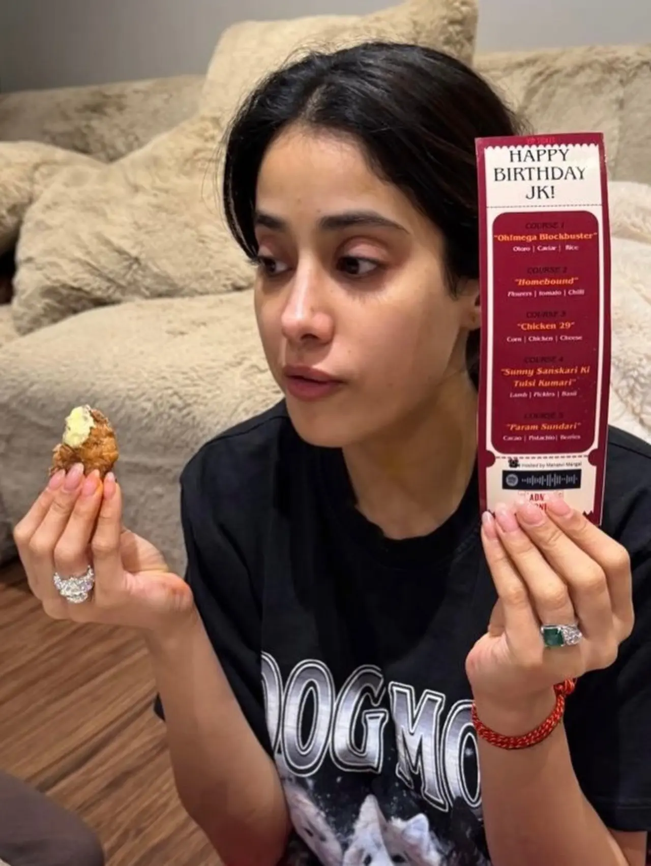 In one of the candid pictures, Janhvi was seen holding the food menu in one hand and a bite in the other.