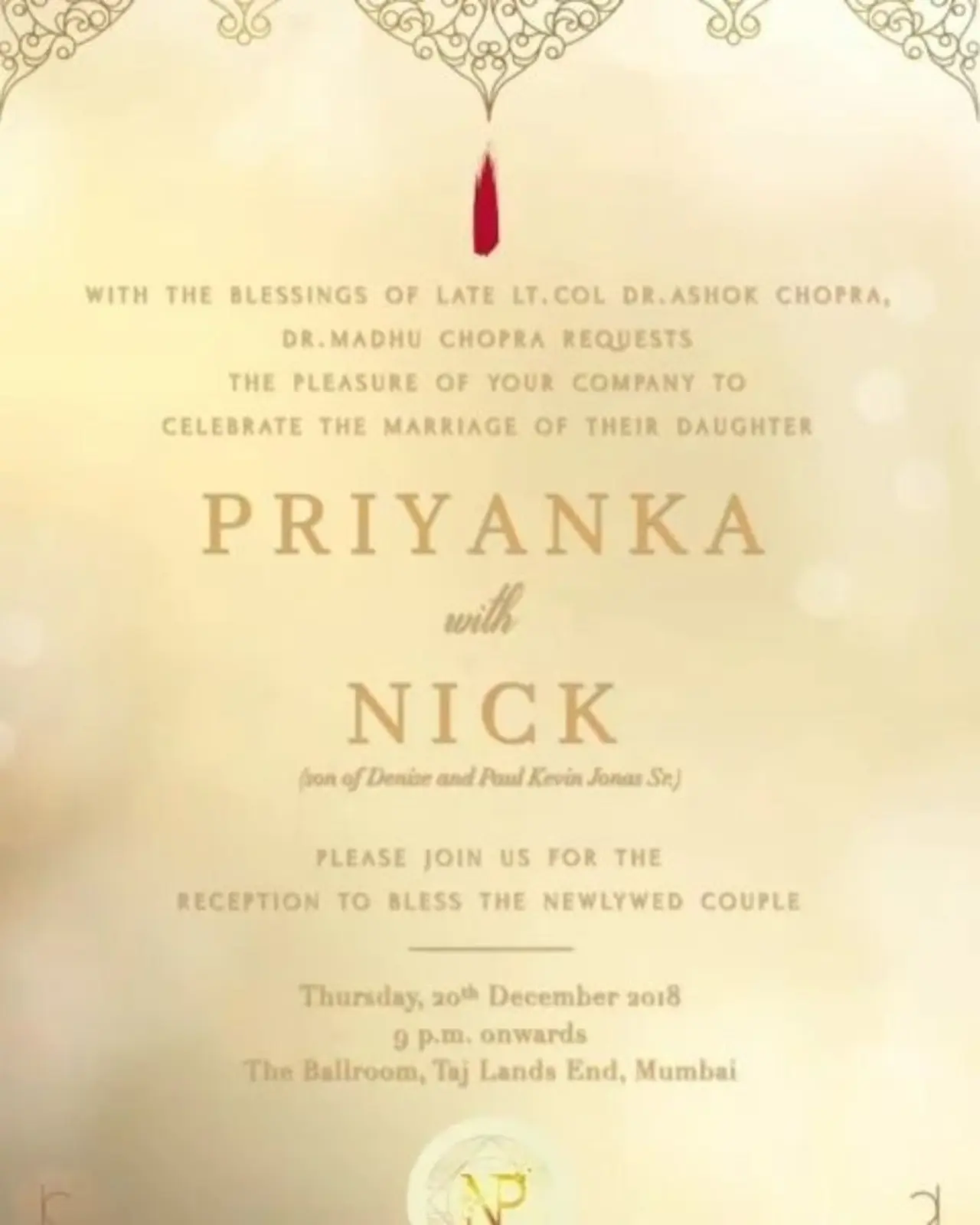 Priyanka Chopra and Nick Jonas' wedding invite had a traditional feel with dark yellow and brown prints on a beige sheet. It also had a red tilak that stood out.