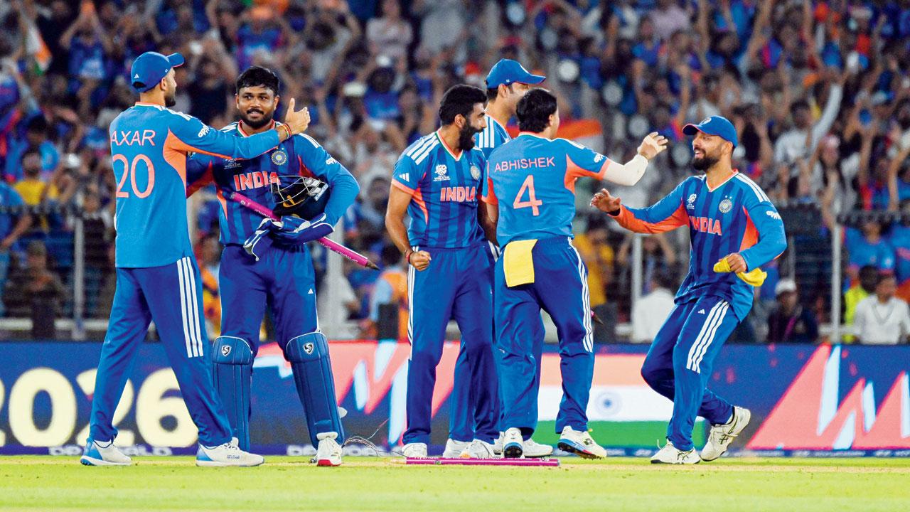 History here: India players celebrate their 96-run win over NZ, for record third T20 World Cup, becoming the first team to achieve the feat at home