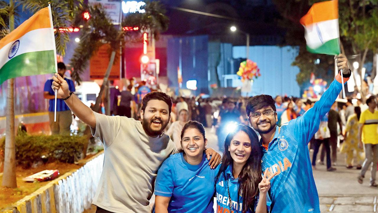 A family poses together during India's T20 World Cup victory celebrations