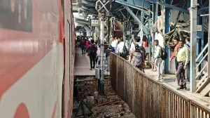 Kalyan-bound AC local train runs past Bhandup station platform