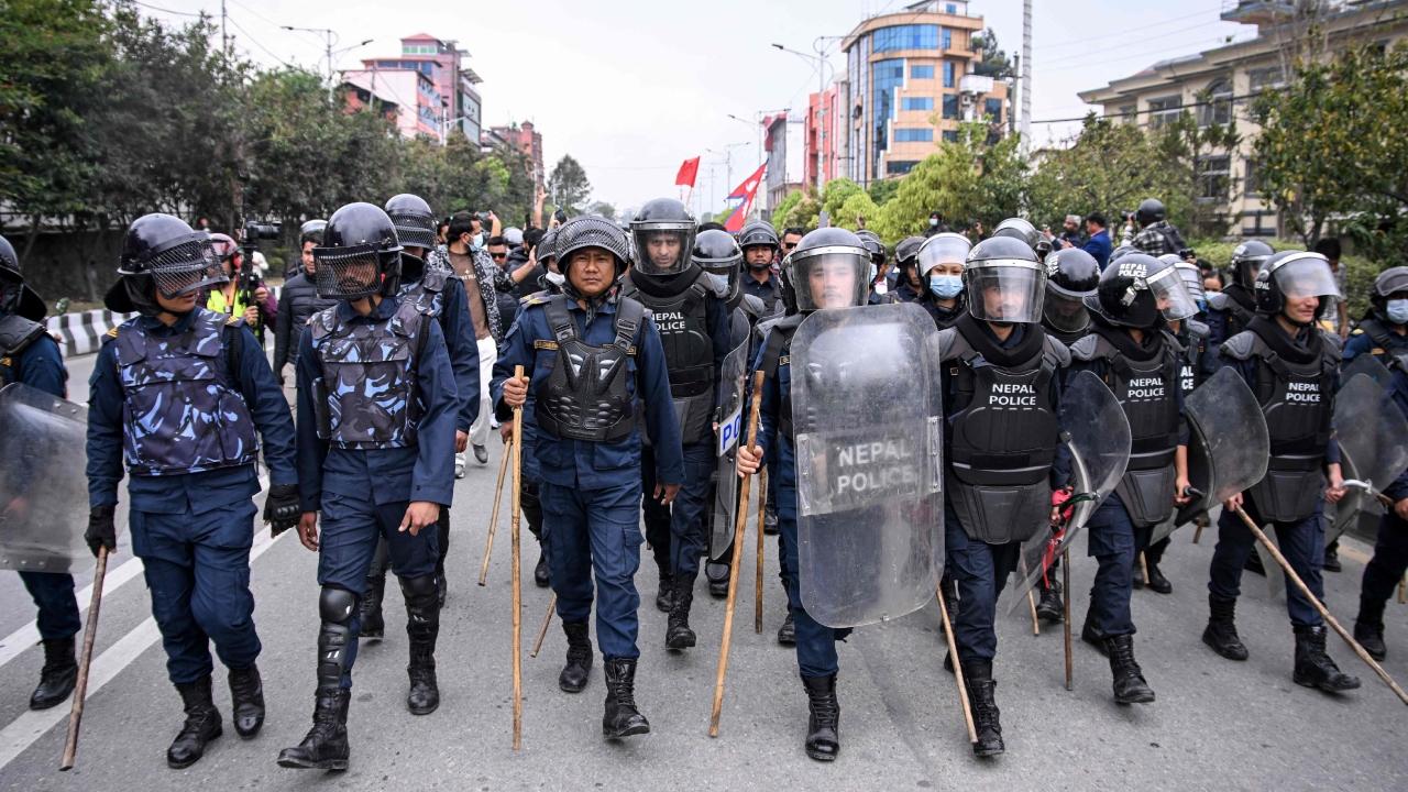 Heavy police deployments on Monday barred the protests as they neared the charred old parliament building, set on fire in the September violence in which at least 76 people were killed