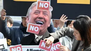 IN PHOTOS: Protests in S. Korea after Trump’s call to deploy warships to Iran