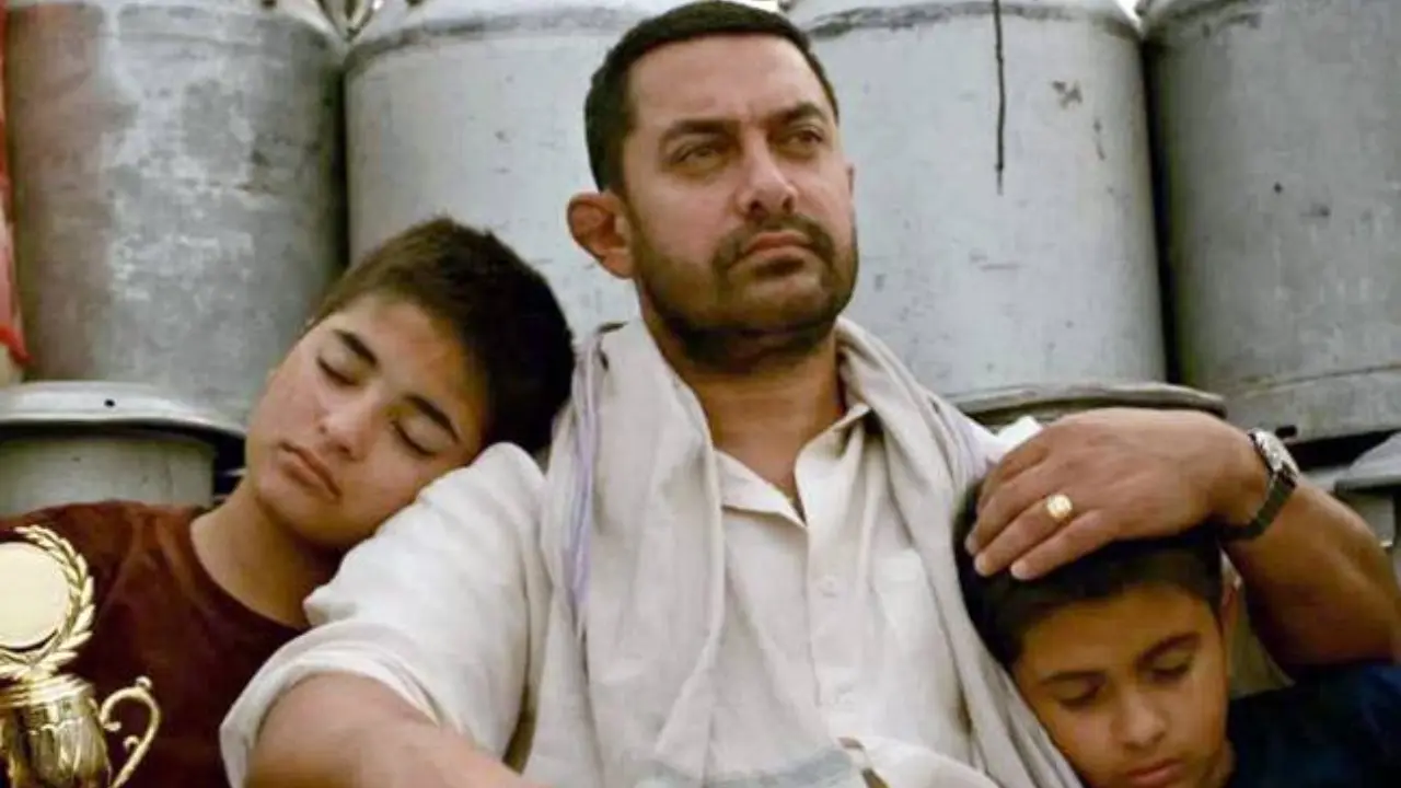 Dhaakad – Dangal
Dhaakad from the film Dangal is a powerful anthem that celebrates courage and determination. The song captures the fierce spirit of wrestlers Geeta Phogat and Babita Phogat as they challenge stereotypes and prove that strength knows no gender.