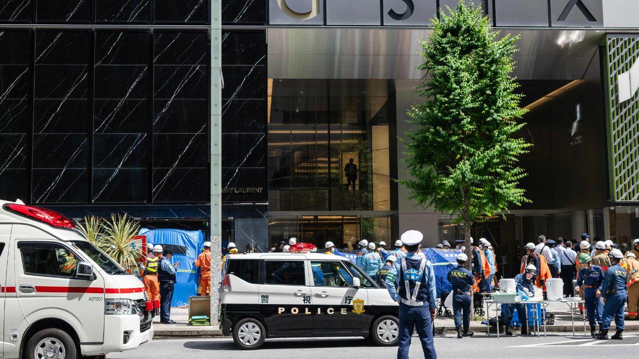 Despite the emergency response outside the building, shoppers continued entering and exiting through side entrances as normal activity carried on at the complex Despite the emergency response outside the building, shoppers continued entering and exiting through side entrances as normal activity carried on at the complex