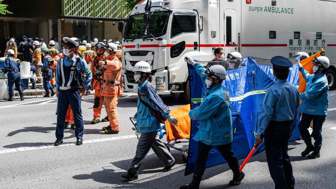 Around 20 people were injured at a luxury shopping complex in central Tokyo on Monday after a man sprayed a substance inside, police and fire department officials said Around 20 people were injured at a luxury shopping complex in central Tokyo on Monday after a man sprayed a substance inside, police and fire department officials said