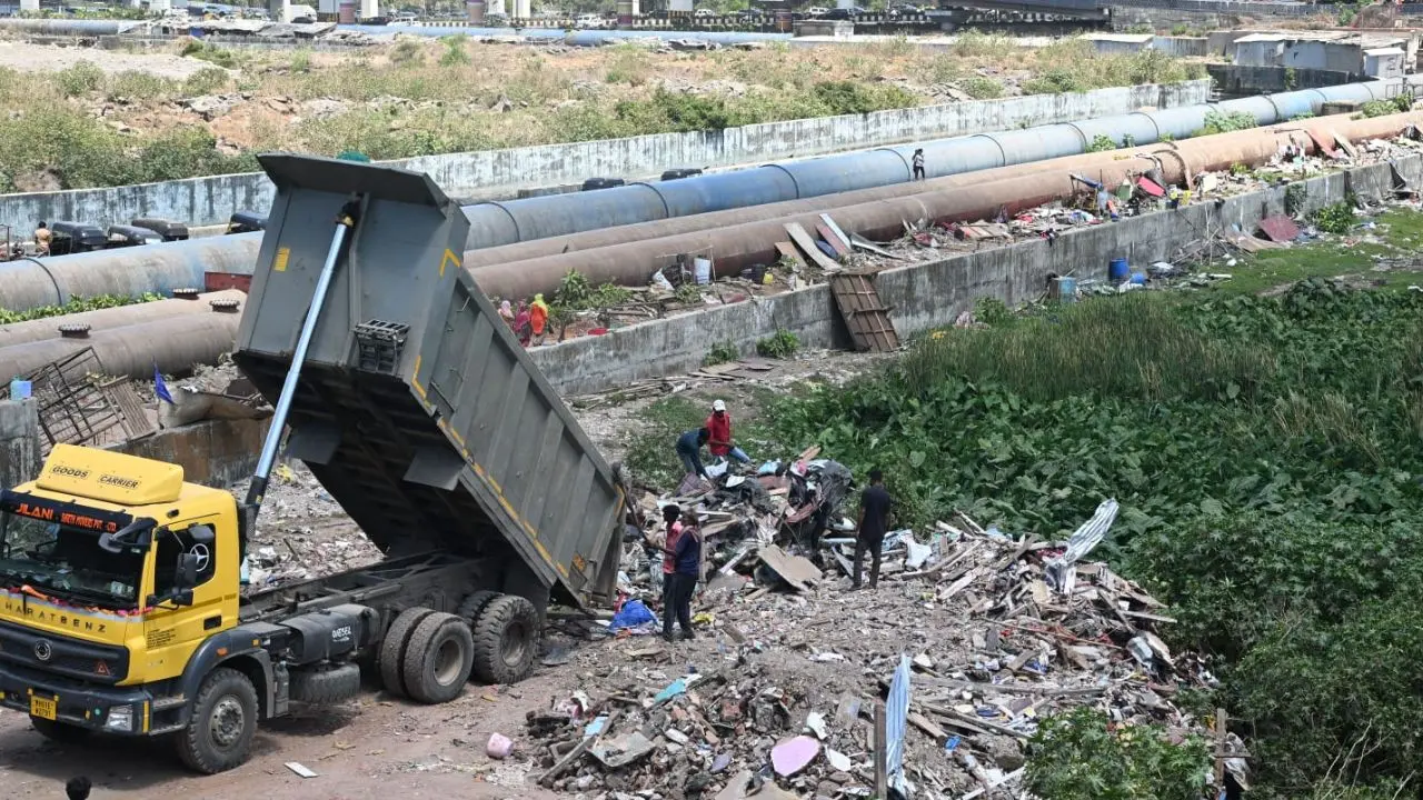 Workers on Monday used heavy machinery to clear the debris and the recently demolished Garib Nagar in Bandra East Workers on Monday used heavy machinery to clear the debris and the recently demolished Garib Nagar in Bandra East