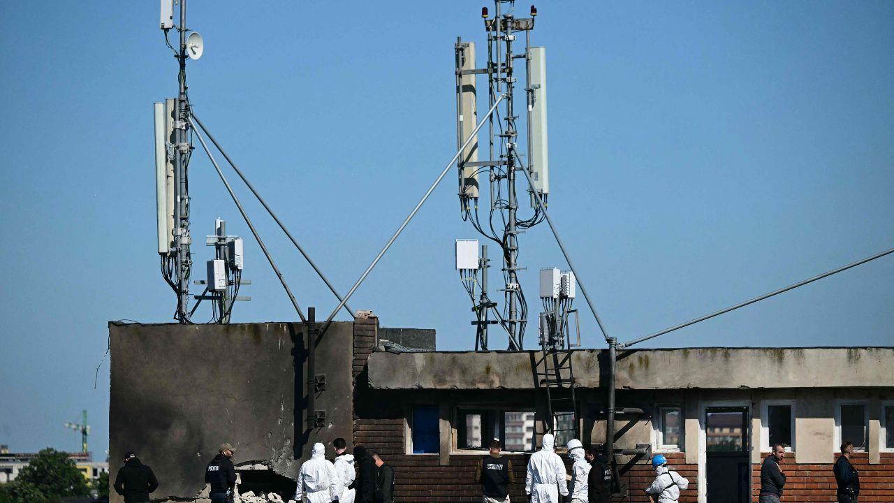 Forensic investigators examine the rooftop impact site where the drone crashed after entering Romanian airspace during overnight attacks near the border Forensic investigators examine the rooftop impact site where the drone crashed after entering Romanian airspace during overnight attacks near the border