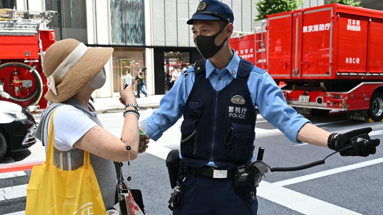 Tokyo Police Spokesman Yusuke Koide told AFP that the man sprayed a substance at an ATM on the ground floor of the building, while a local fire department official said "around 20 people were injured" after a report of a "smell" Tokyo Police Spokesman Yusuke Koide told AFP that the man sprayed a substance at an ATM on the ground floor of the building, while a local fire department official said "around 20 people were injured" after a report of a "smell"