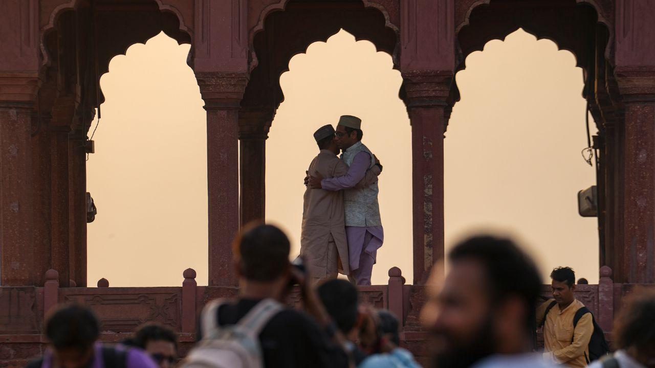 Men greet each other with hugs and “Eid Mubarak” after prayers end Men greet each other with hugs and “Eid Mubarak” after prayers end