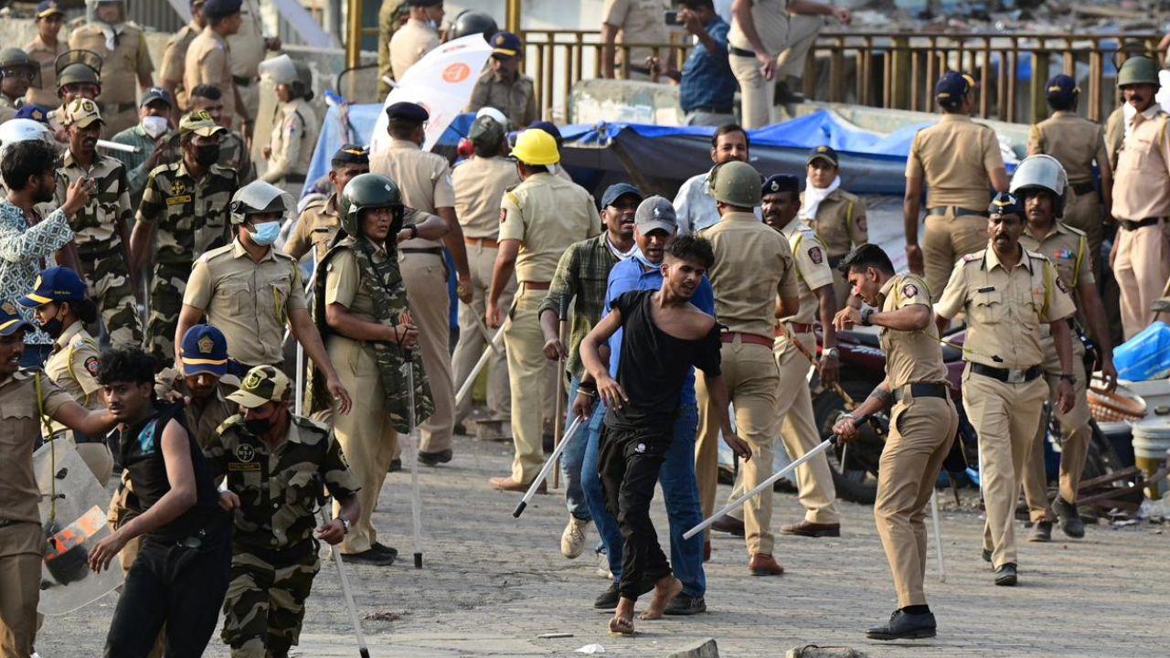 Despite heavy security presence, the atmosphere remains tense and concerning, with a large number of people continuing to gather near the site to witness the demolition drive Despite heavy security presence, the atmosphere remains tense and concerning, with a large number of people continuing to gather near the site to witness the demolition drive