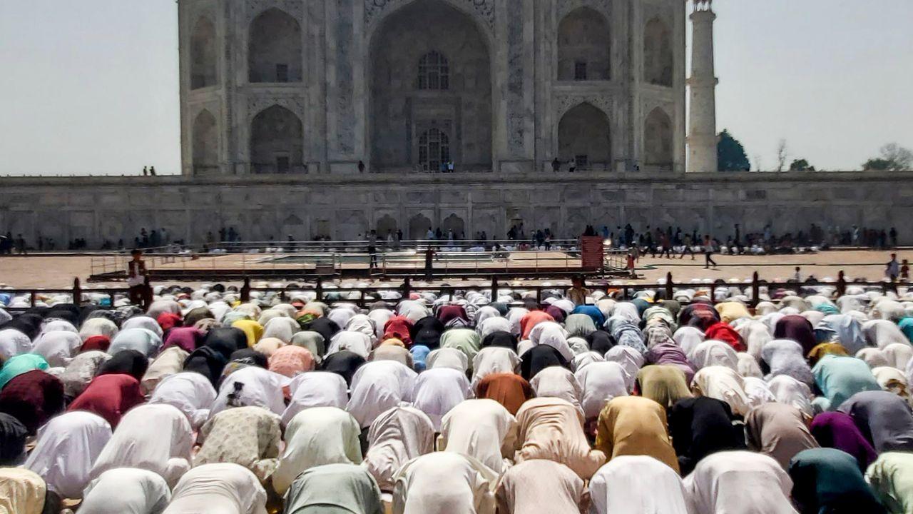 Rows of devotees bow in prayer at the Taj Mahal complex as Muslims across India observe Eid al-Adha Rows of devotees bow in prayer at the Taj Mahal complex as Muslims across India observe Eid al-Adha