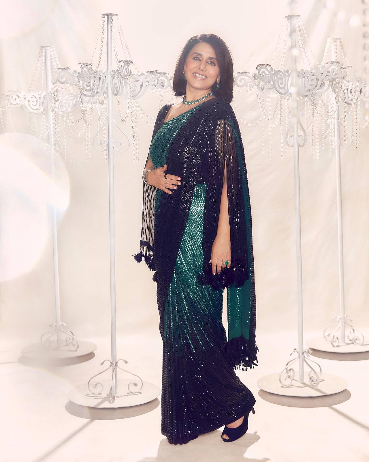 Neetu Kapoor embodies timeless elegance with a modern touch, making her one of Bollywood&rsquo;s most graceful fashionable moms. Whether in classic ethnic wear or understated contemporary outfits, she exudes sophistication.