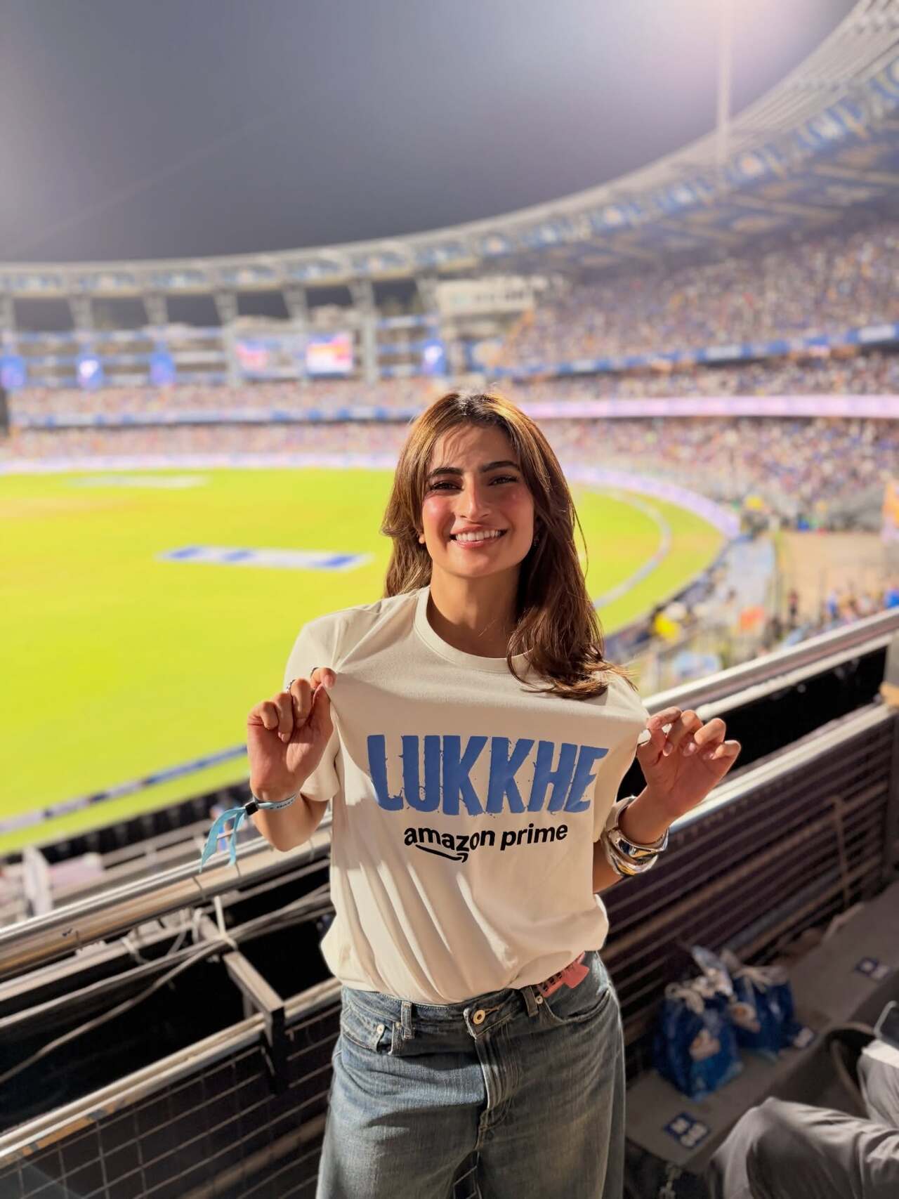 Palak Tiwari kept her IPL outing effortlessly stylish in a fitted white T-shirt featuring Lukkhe branding, paired with relaxed light blue denims.