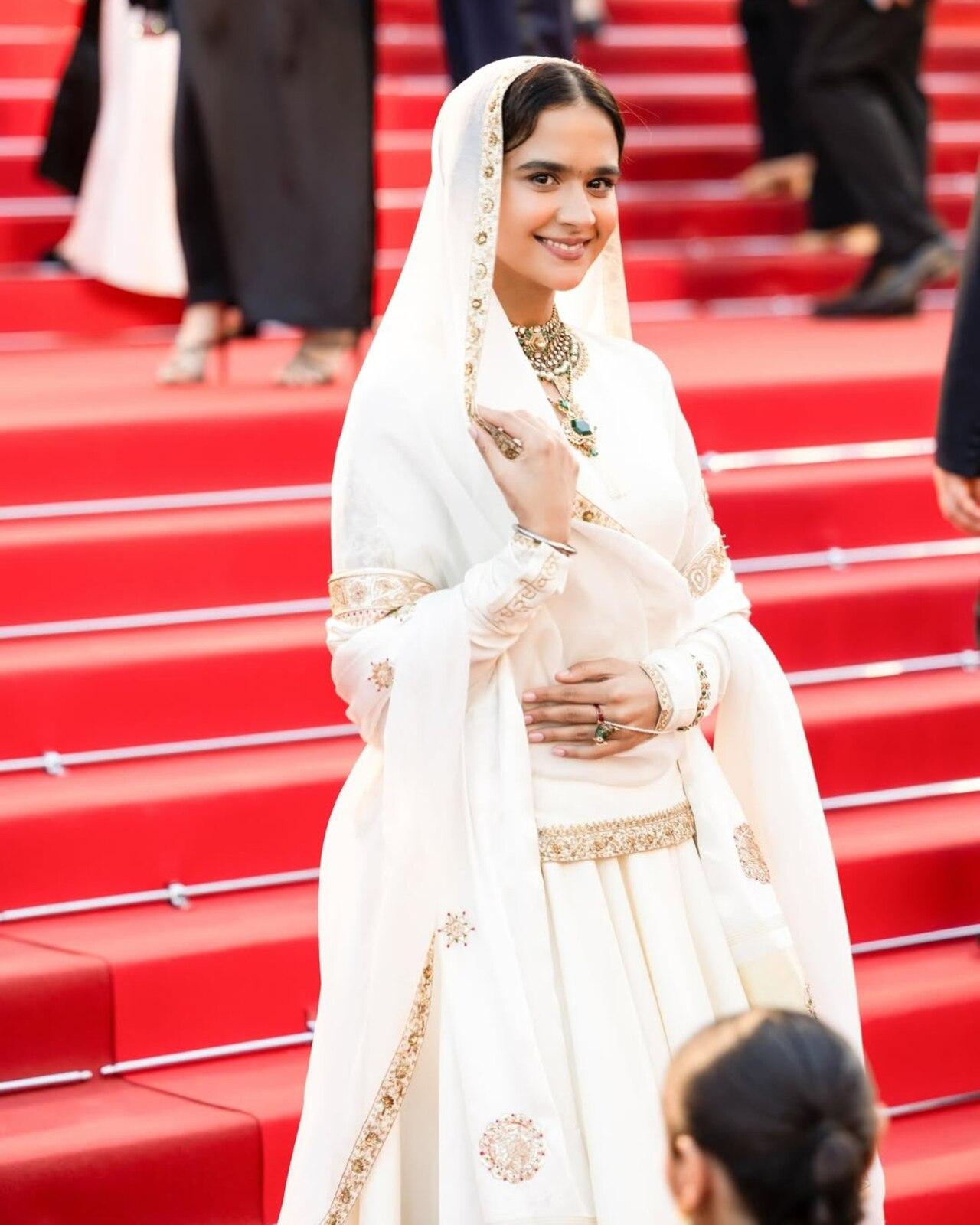 Roopinder Kaur Gill (Roopi Gill)
Punjabi actress and influencer Roopinder Kaur Gill brought the pride of Punjab to Cannes 2026. Promoting her film Chardikala, she dazzled in an ivory traditional embroidered ensemble with bold Punjabi jewellery.