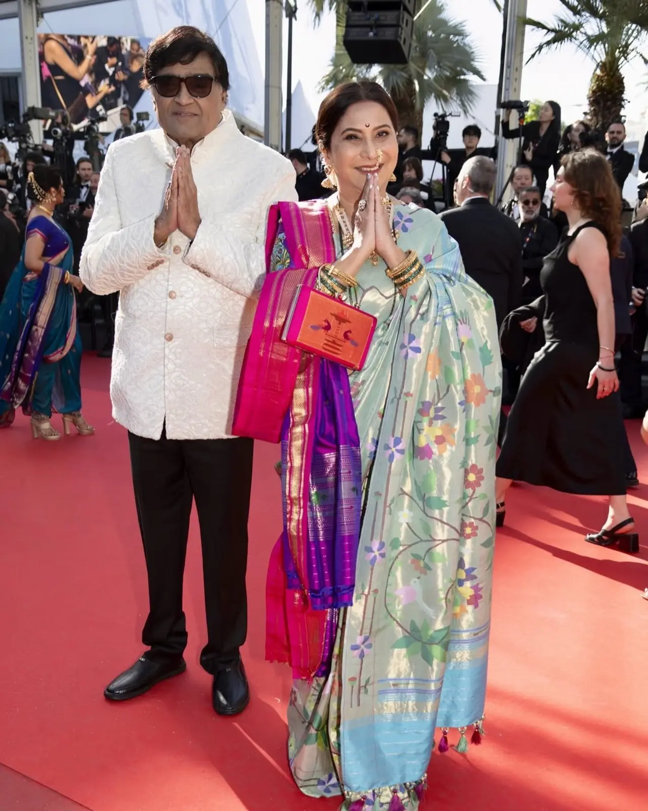 Ashok Saraf and his wife promoting Maharashtrian culture
Ashok Saraf, 78, attended the Cannes Film Festival with wife Nivedita as part of a Marathi delegation. The actor couple's appearance at the Indian Pavilion and on the red carpet put Marathi cinema and Maharashtrian culture in global view. Ashok Saraf and his wife promoting Maharashtrian culture
Ashok Saraf, 78, attended the Cannes Film Festival with wife Nivedita as part of a Marathi delegation. The actor couple's appearance at the Indian Pavilion and on the red carpet put Marathi cinema and Maharashtrian culture in global view.