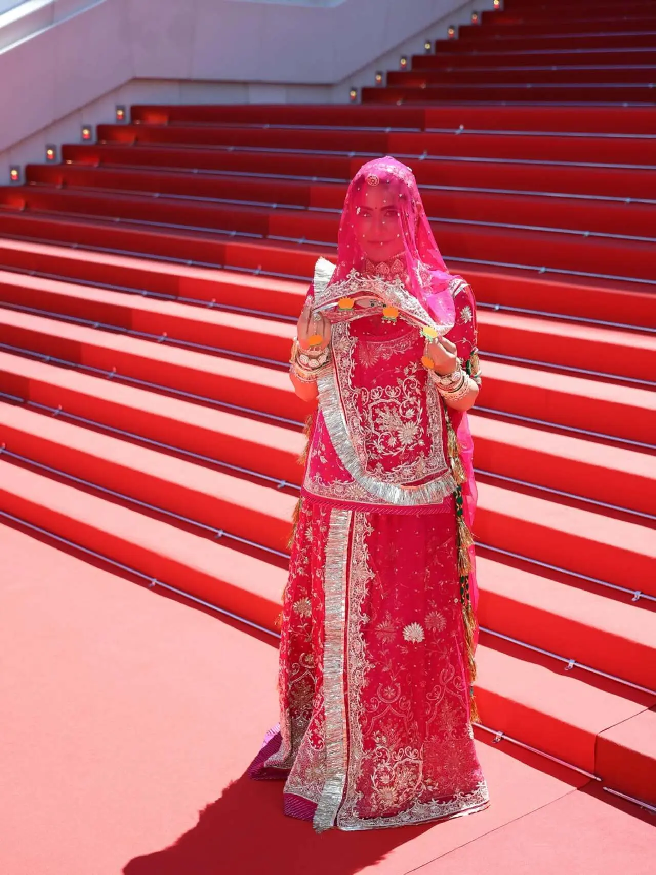 Ruchi Gujjar
Indian actress Ruchi Gujjar stole the spotlight at the Cannes Film Festival 2026 in a vibrant pink Rajasthani ensemble with a dramatic ghunghat-inspired veil.&nbsp;