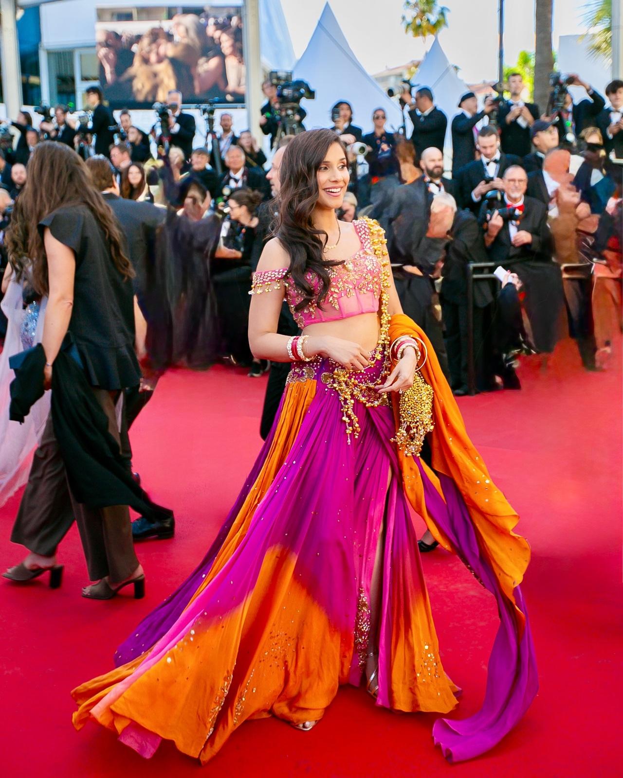 Nidhi Kumar
Dancer and content creator Nidhi Kumar made history as the first Indian dance creator to walk the Cannes red carpet. She wore a custom Madhuri Dixit-inspired couture ensemble by Rachit Khanna.