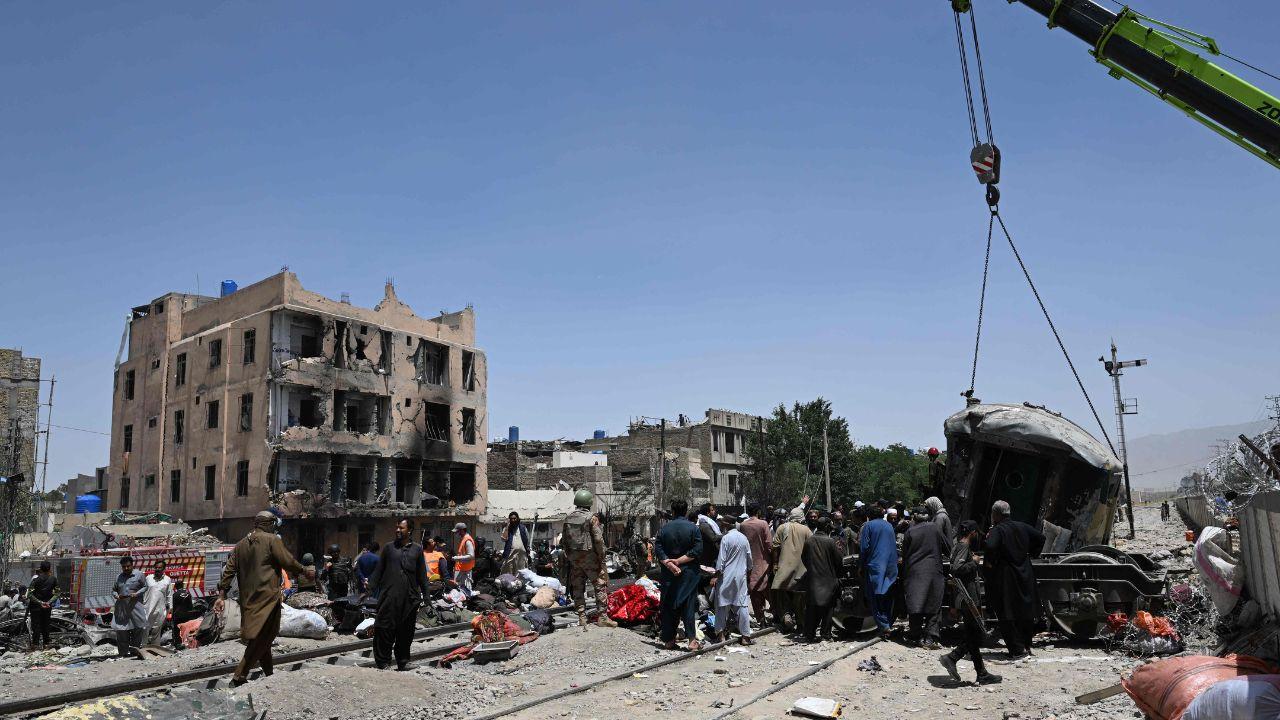 Residents and rescue workers climb over shattered coaches in desperate attempts to help survivors following the deadly explosion Residents and rescue workers climb over shattered coaches in desperate attempts to help survivors following the deadly explosion