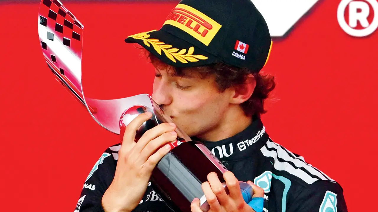 Kimi Antonelli with the winner’s trophy on Sunday. Pic/AFP