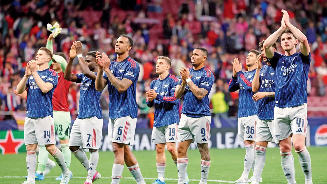 Arsenal players applaud their fans following a 1-1 draw with Atletico Madrid in the UCL semi-final first leg on Wednesday. Pic/AFP