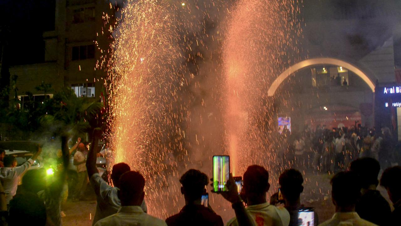 Supporters burst firecrackers as the BJP won 81 seats in the 126-member Assam. Its allies, Bodoland Peoples Front and Asom Gana Parishad, won 10 seats each