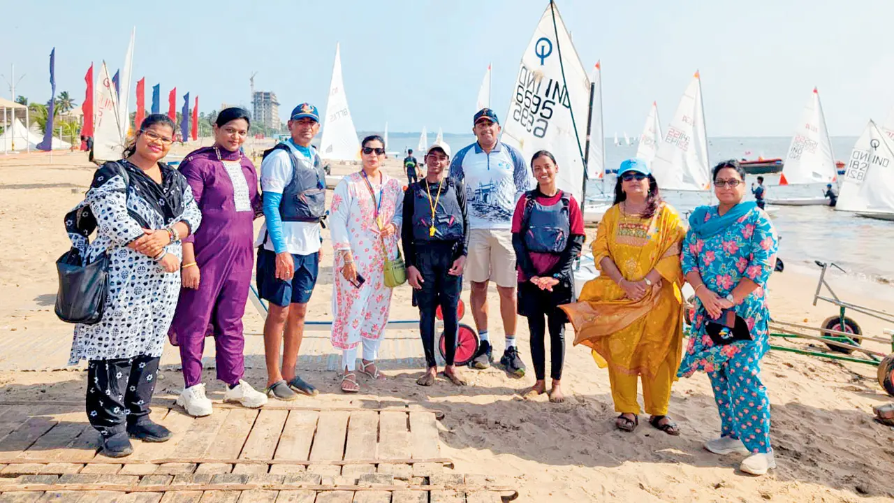 Atif Ansari (fifth from right), Lt Col Ameya Humnabadkar (fourth from right), and Sanjana Singh (third from right), flanked by BMC teachers and officials. PIC/ADITI ALURKAR